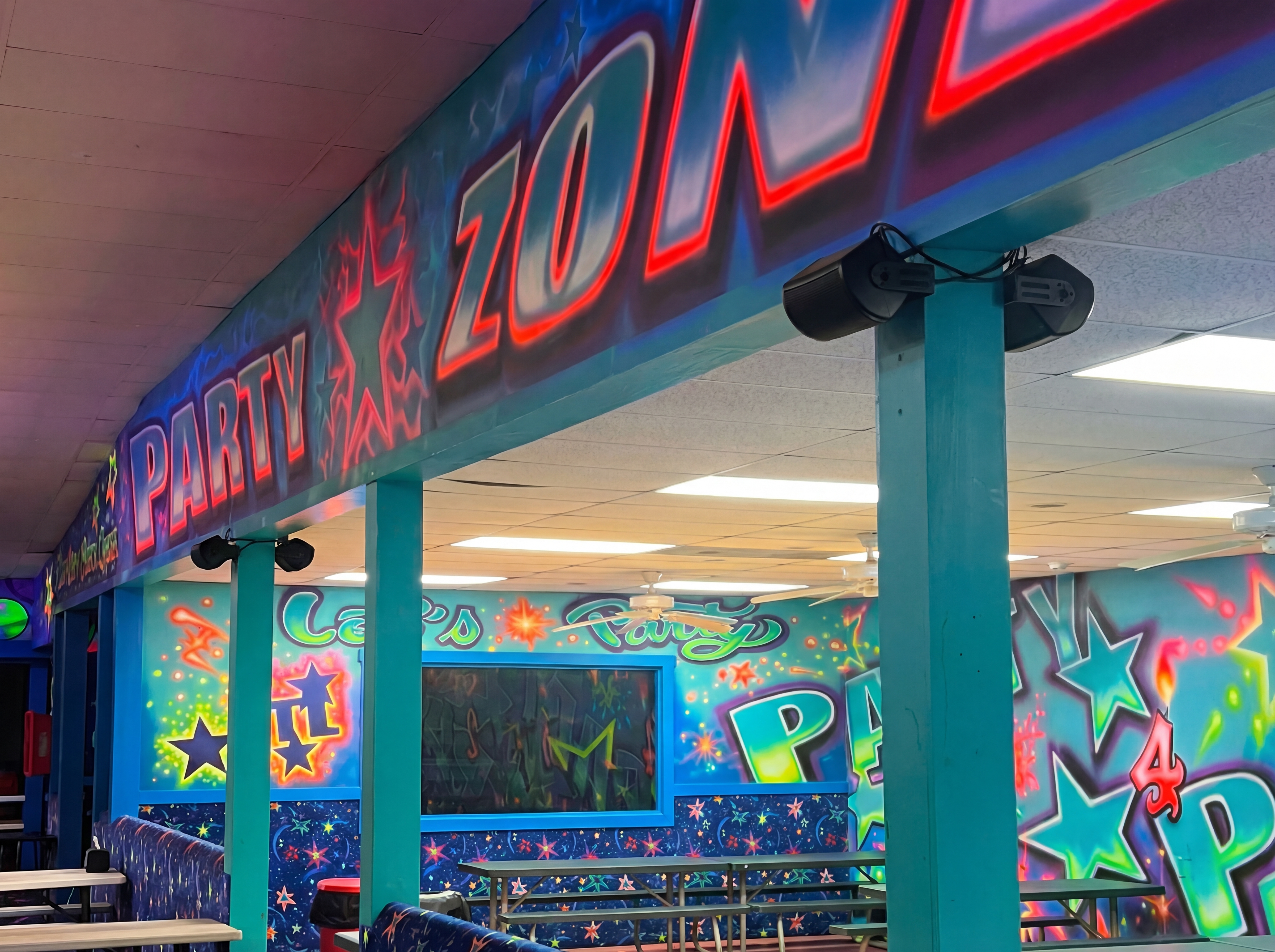 Party zone cafe with ceiling mounted speakers